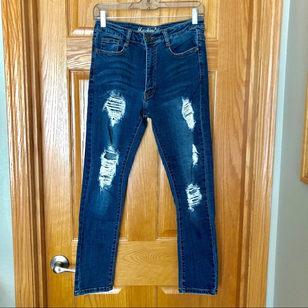 Distressed blue skinny jeans